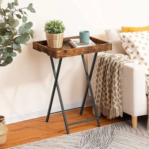 folding tray table decorated with plant and books