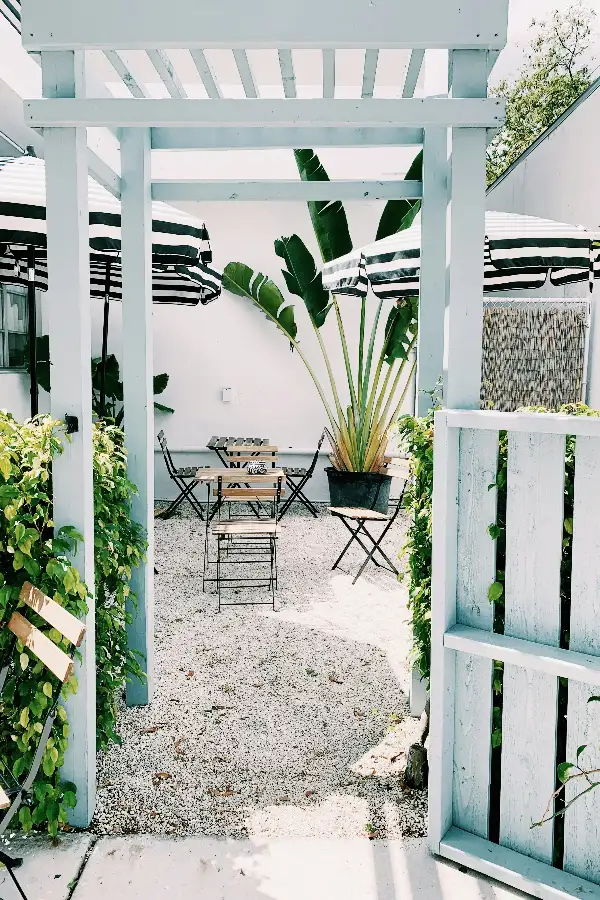 tv tray tables and chairs on the patio