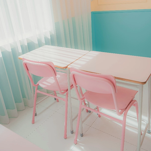 pink desks and chairs